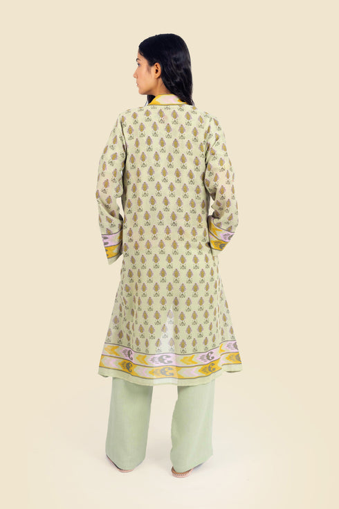 Coat in cotton gauze with asymmetric hemline